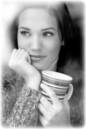 woman looking out window_bw